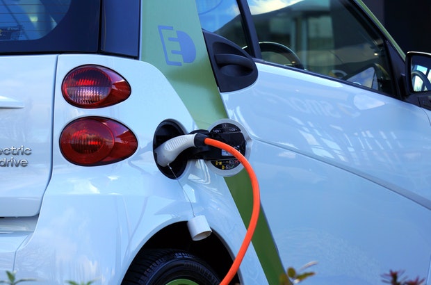 An electric car at a charging point.